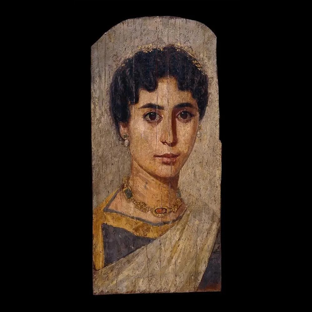 Retrato do Faium sobre painel de madeira: jovem mulher.